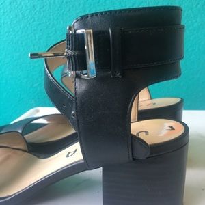 Strapped black heel